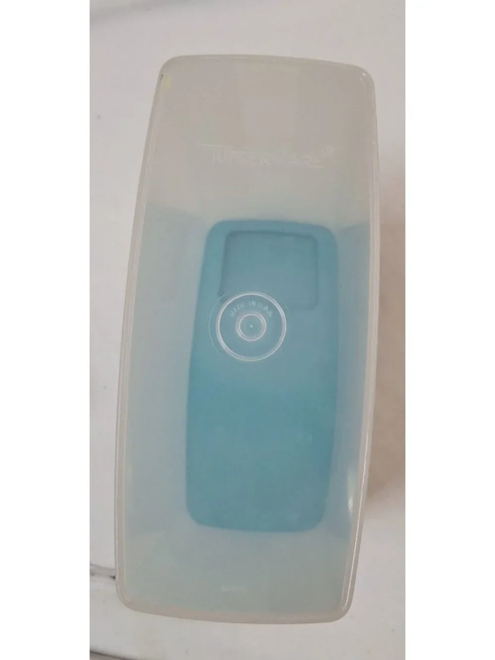 Vintage Tupperware 20-cup super cereal keeper in sheer white with an Aqua Blue l
